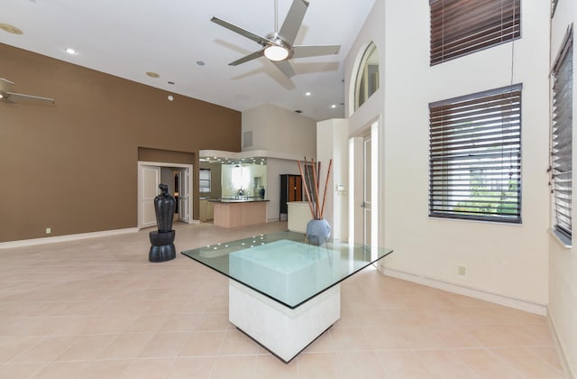 kitchen featuring ceiling fan and light tile patterned flooring