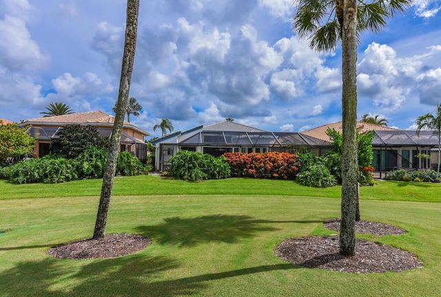 view of yard featuring a lanai