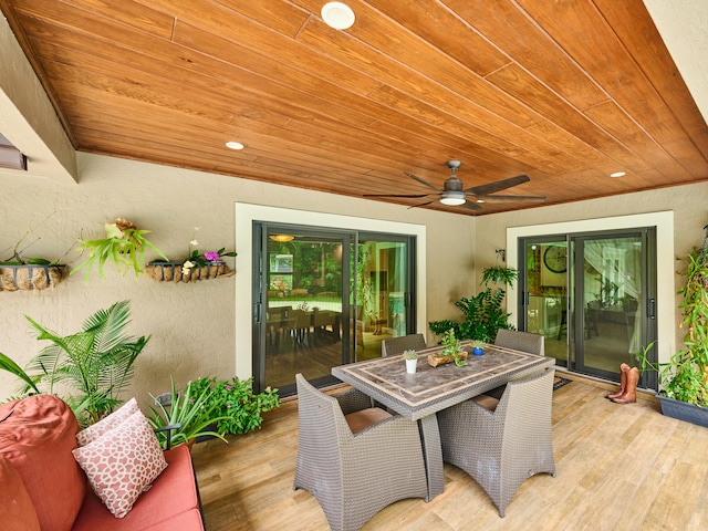 wooden deck with ceiling fan