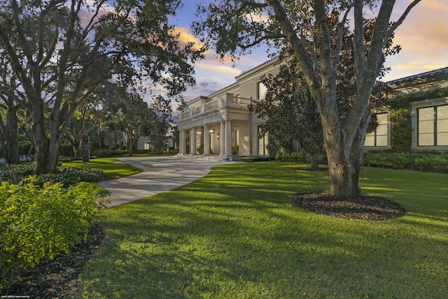 surrounding community featuring a lawn