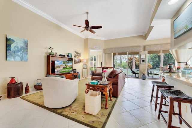 living room featuring light tile patterned floors, ceiling fan, and ornamental molding