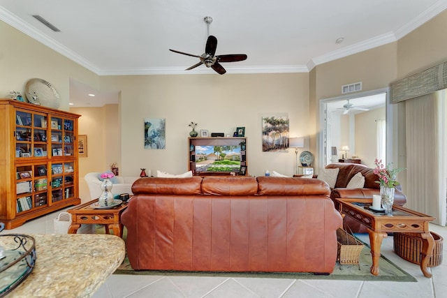 tiled living room featuring ceiling fan and ornamental molding