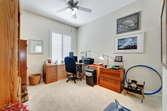 office area with light carpet and ceiling fan