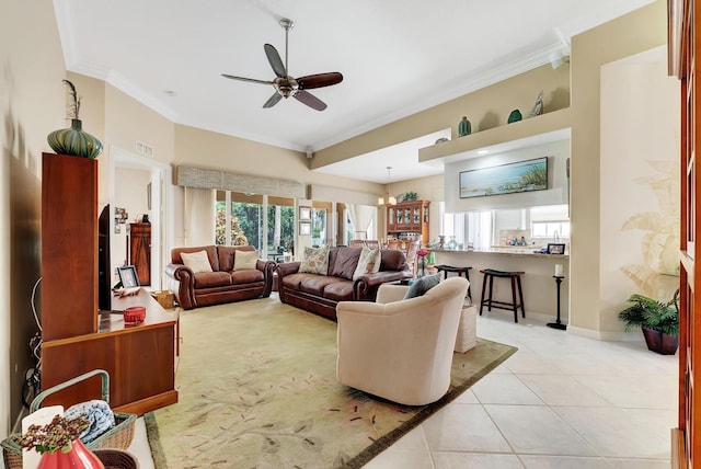 tiled living room featuring crown molding and ceiling fan