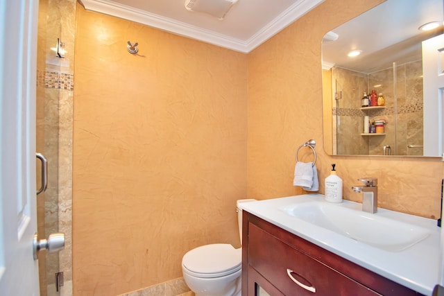 bathroom with walk in shower, crown molding, toilet, and vanity