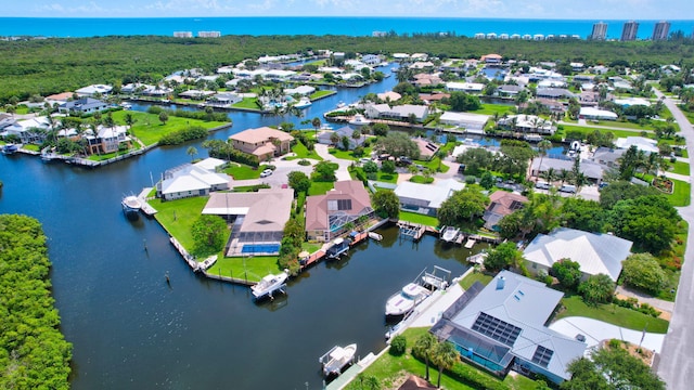 drone / aerial view featuring a water view