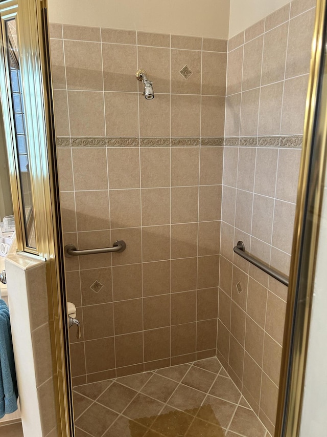full bathroom with a shower stall