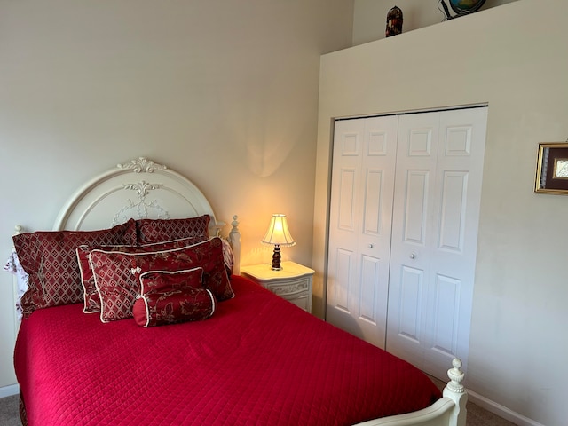 bedroom featuring a closet and carpet