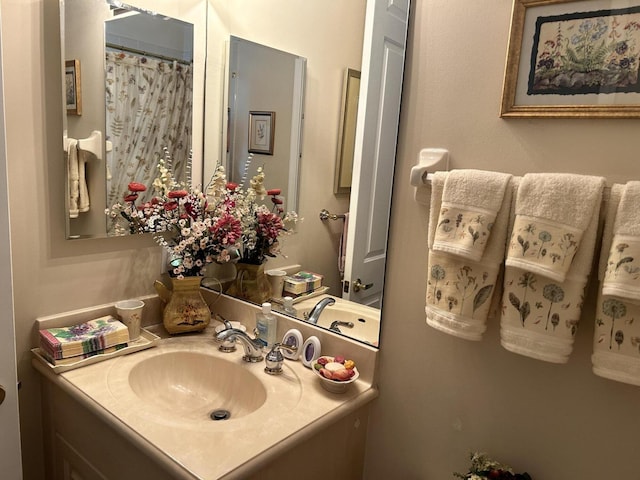 full bath featuring vanity