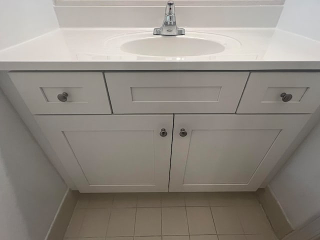 bathroom featuring vanity and tile patterned flooring