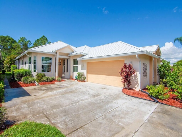 single story home featuring a garage