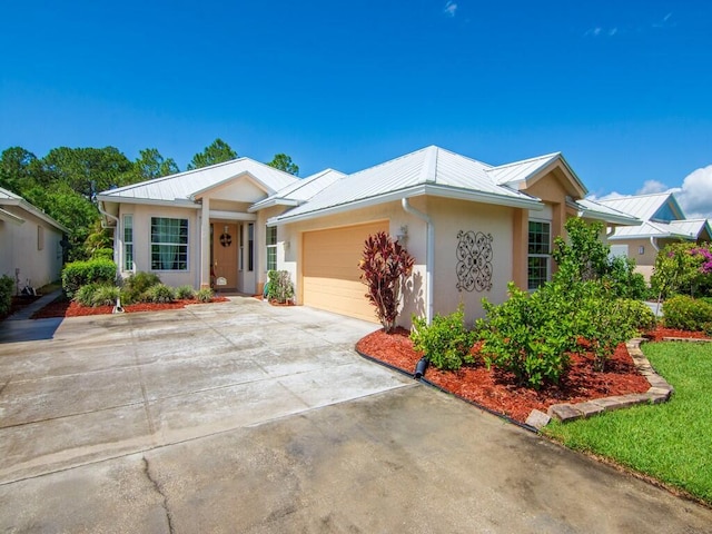 ranch-style house featuring a garage