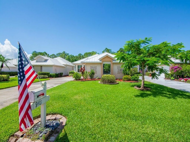 single story home featuring a front yard