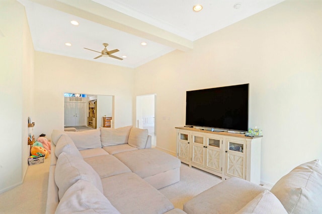 living room with ceiling fan, crown molding, lofted ceiling, and light colored carpet