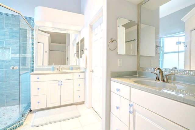 bathroom with vanity and an enclosed shower