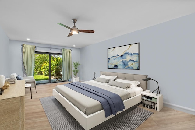 bedroom featuring ceiling fan, light wood-type flooring, and access to outside