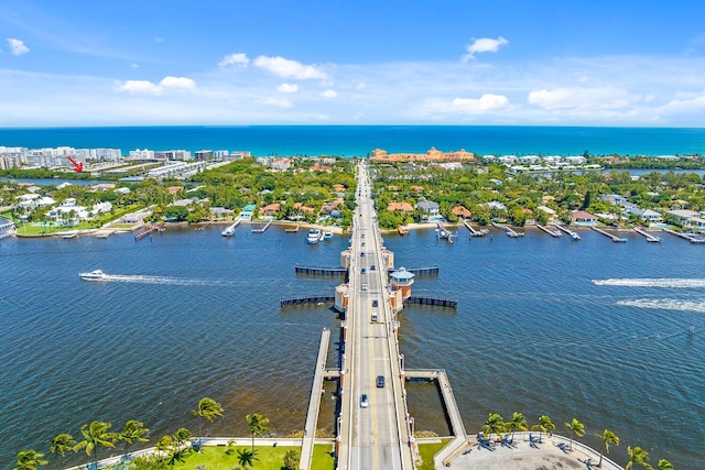 birds eye view of property featuring a water view