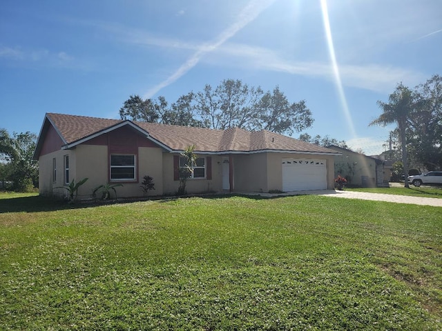 ranch-style house with a front yard and a garage