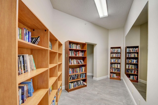 interior space with a textured ceiling