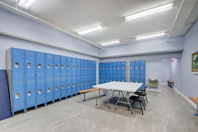 interior space with a textured ceiling