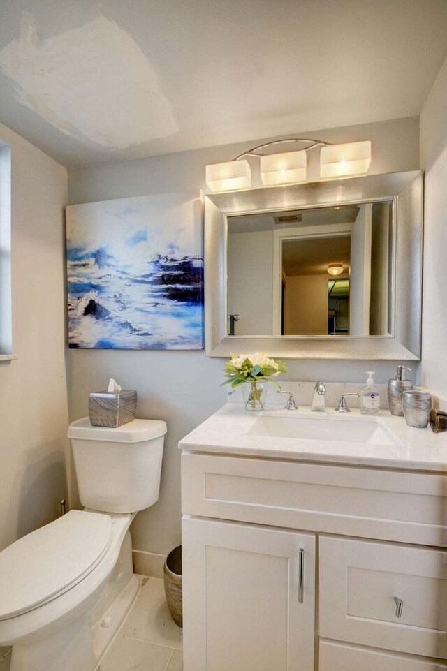 kitchen with white cabinets, tile patterned floors, white appliances, and sink