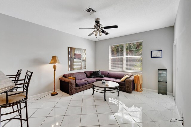 dining room featuring light tile patterned flooring and a chandelier