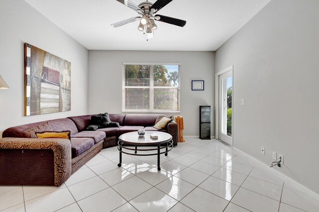 dining area with ceiling fan, light tile patterned flooring, and plenty of natural light