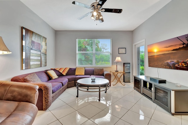 tiled living room with ceiling fan