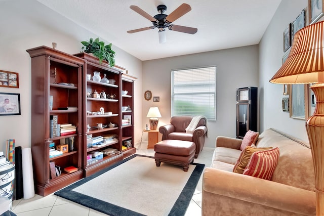 tiled living room with ceiling fan