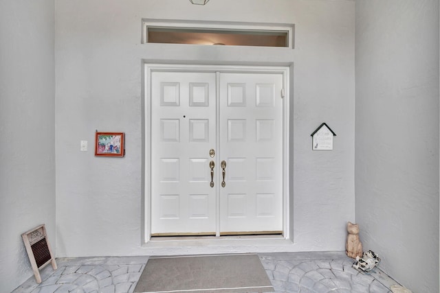 doorway to property with visible vents