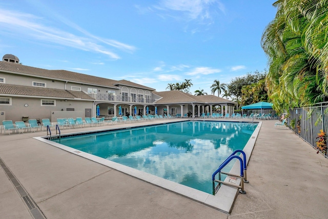 view of swimming pool with a patio area