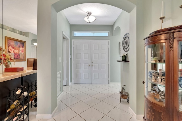 view of tiled entrance foyer