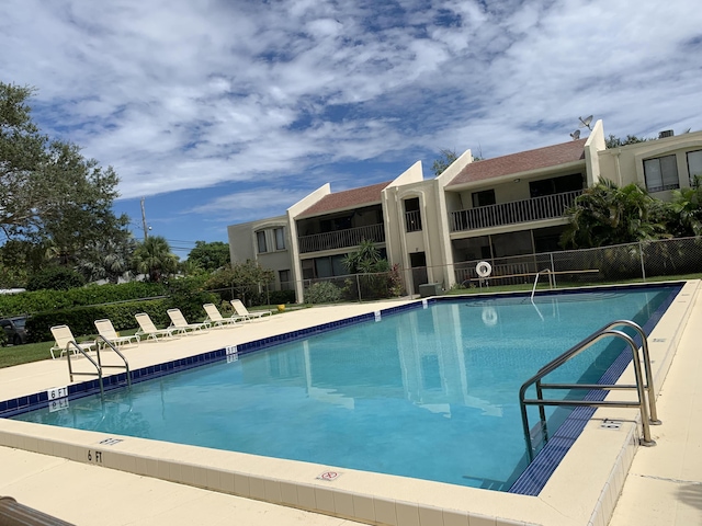 view of swimming pool featuring a patio