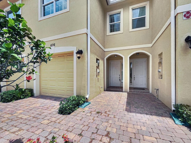 property entrance featuring a garage