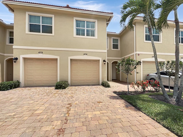 view of front of home with a garage