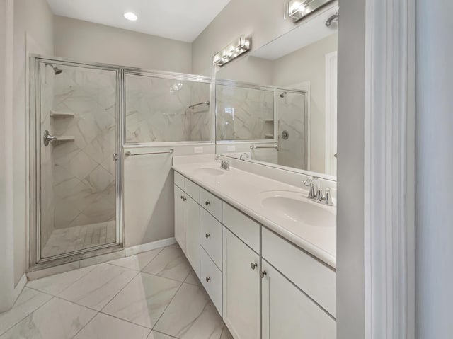 bathroom with vanity and an enclosed shower