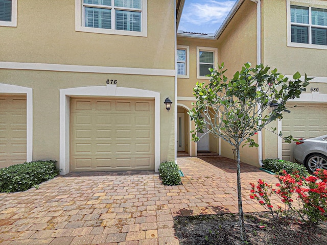 view of front of property with a garage