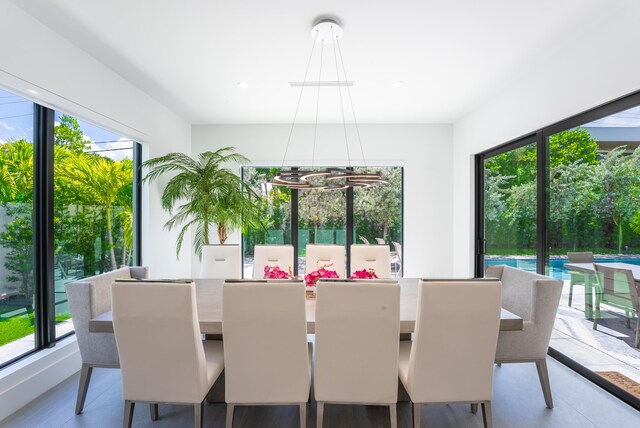 dining space featuring a chandelier