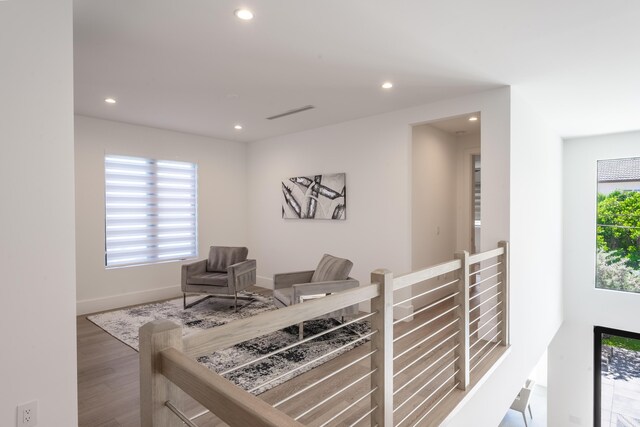 interior space featuring a wealth of natural light and wood-type flooring