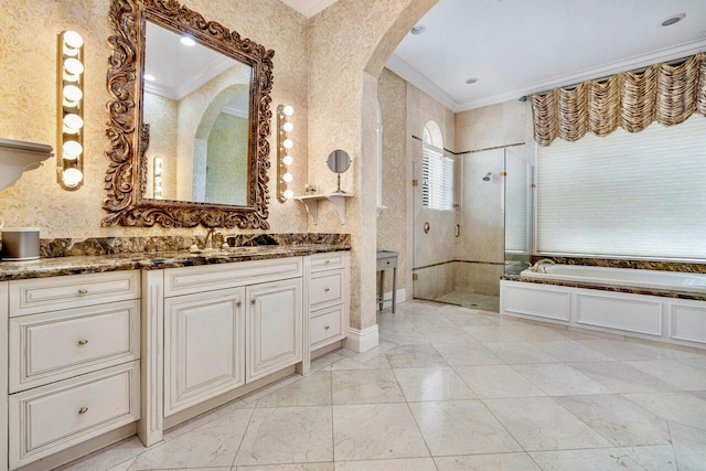 bathroom with vanity, separate shower and tub, and crown molding