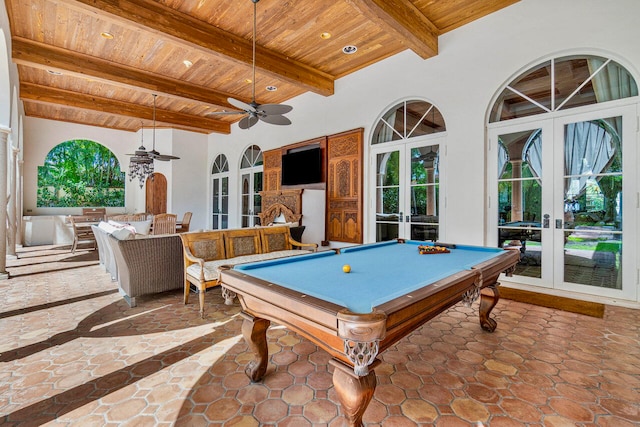 game room featuring french doors, ceiling fan, pool table, beamed ceiling, and wood ceiling