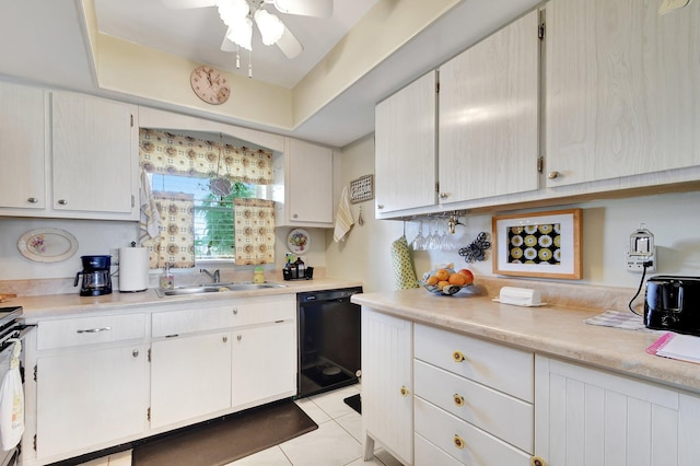 kitchen with white cabinetry, black dishwasher, sink, light tile patterned flooring, and ceiling fan