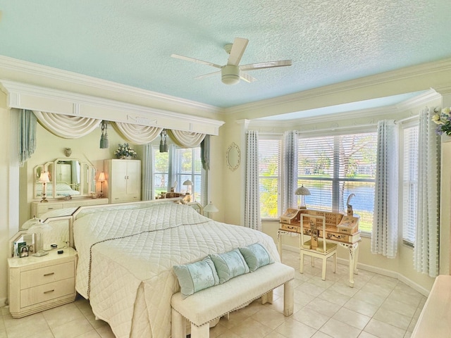 tiled bedroom featuring ceiling fan, crown molding, and a textured ceiling