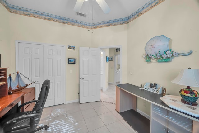 tiled home office with ceiling fan