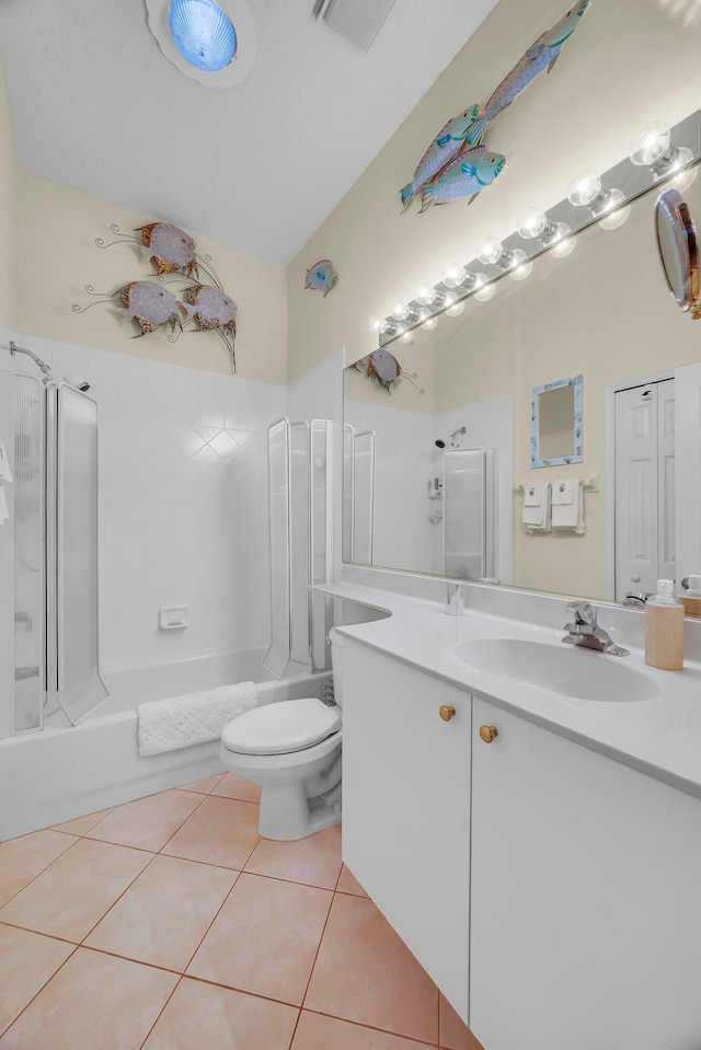 full bathroom with shower / washtub combination, tile patterned flooring, vanity, and toilet