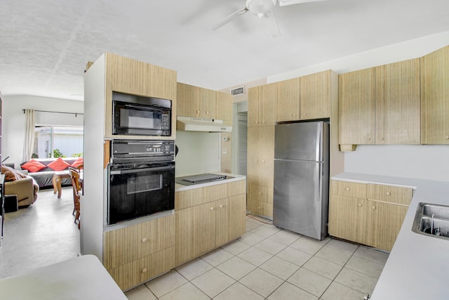 kitchen featuring light tile patterned floors, light brown cabinets, ceiling fan, and black appliances