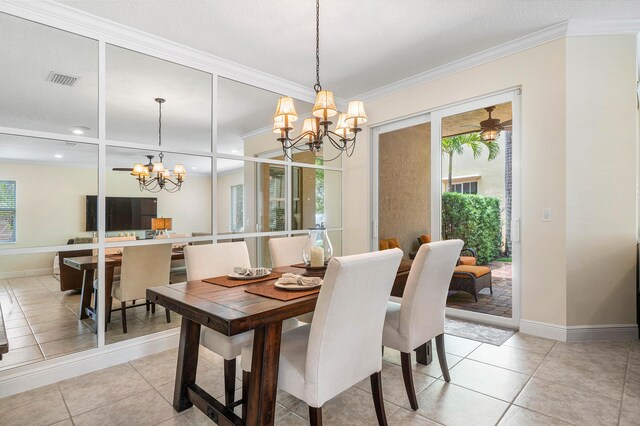 tiled dining room featuring ornamental molding, a wealth of natural light, and an inviting chandelier