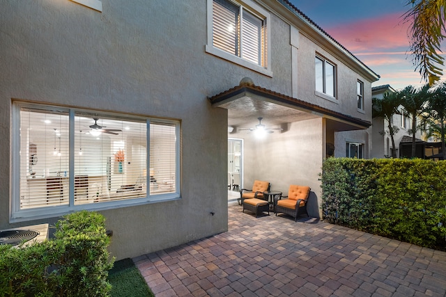 exterior space featuring a patio area and ceiling fan