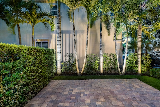 property entrance with a patio