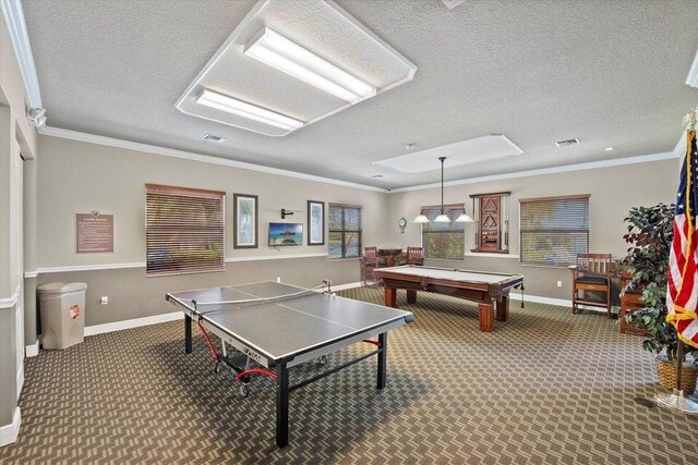 playroom with carpet floors, a textured ceiling, ornamental molding, and pool table